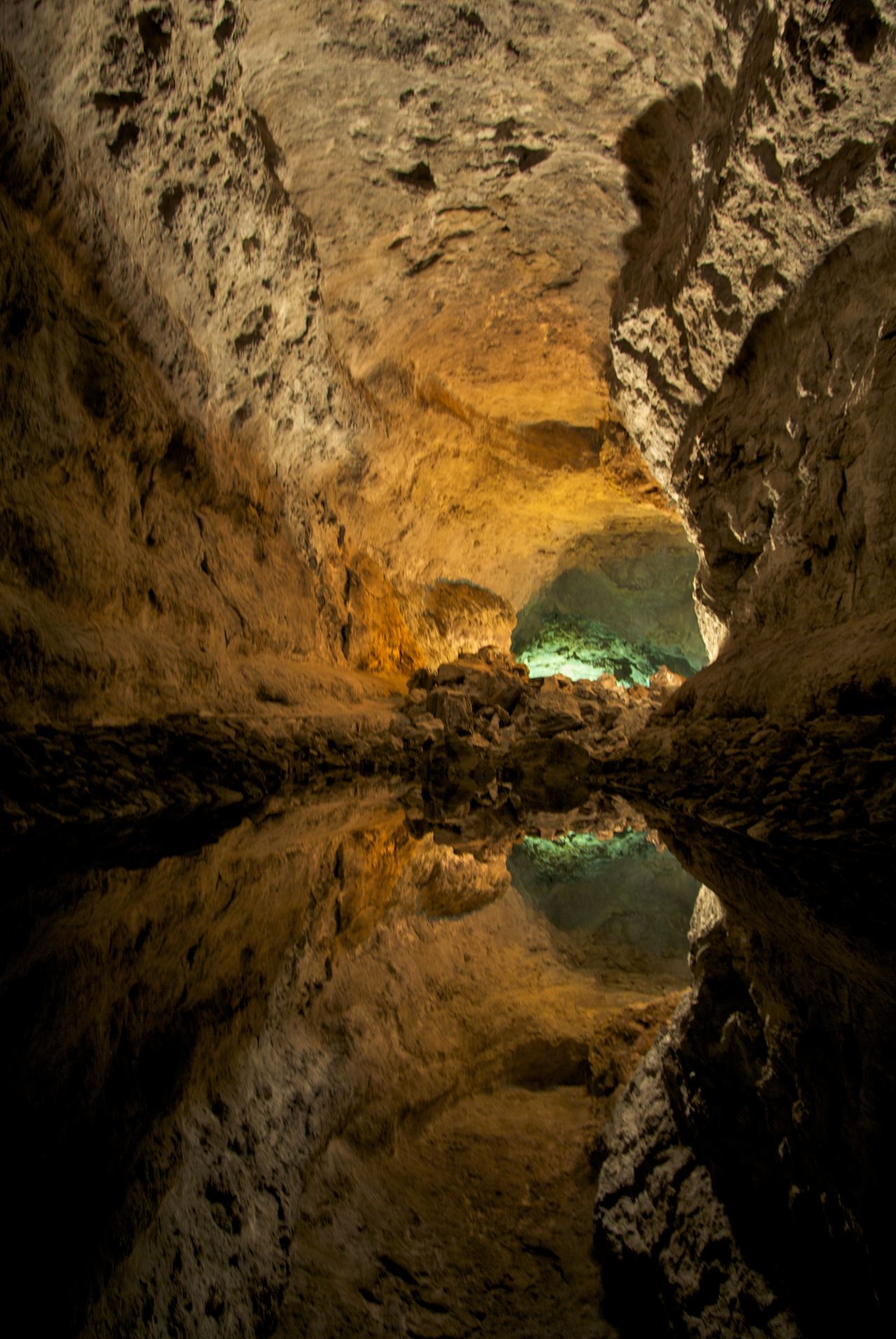 Illuminated passage in Cueva de los Verdes