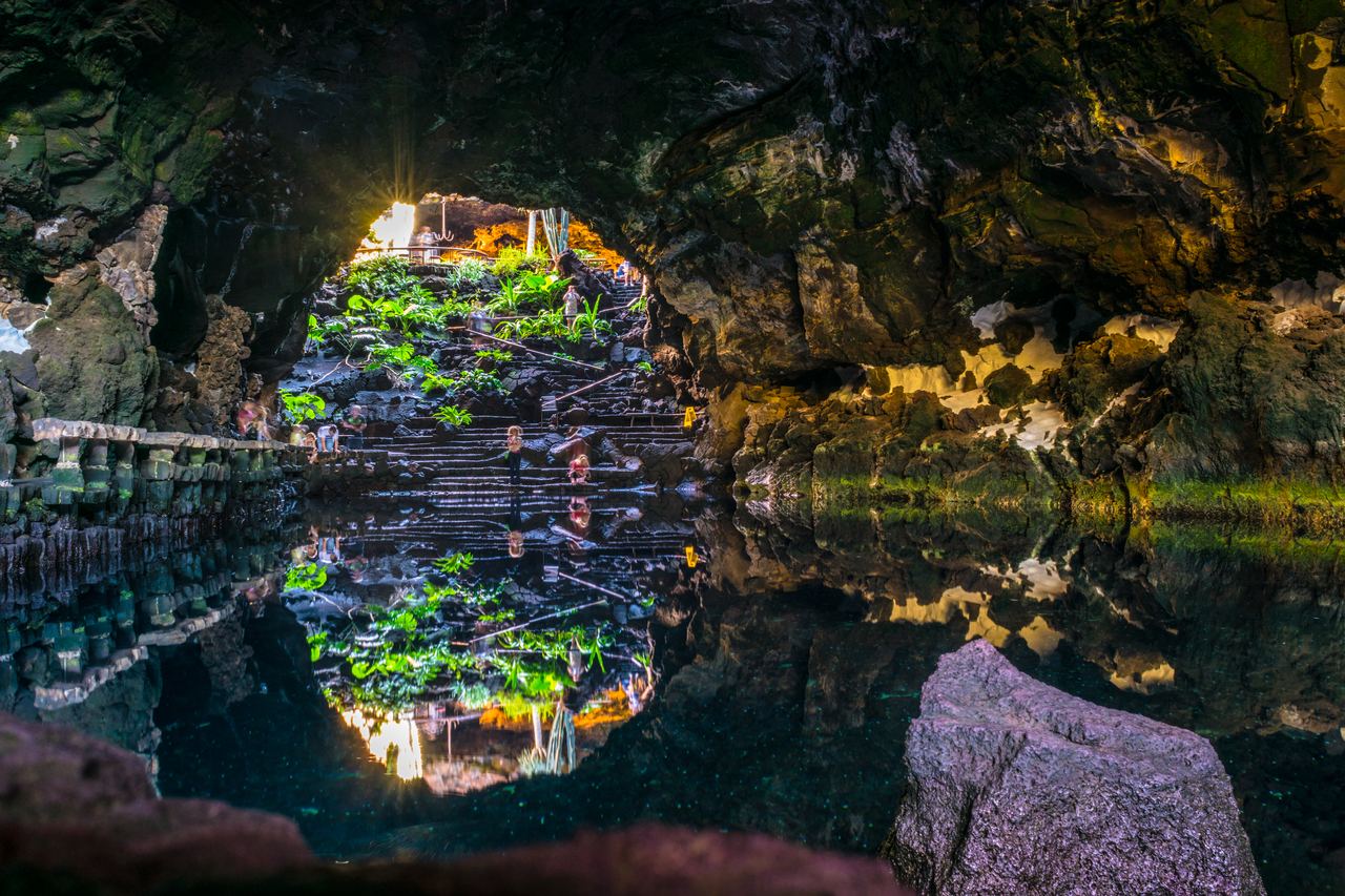 Lava cave at Jameos del Agua reflected in the lake